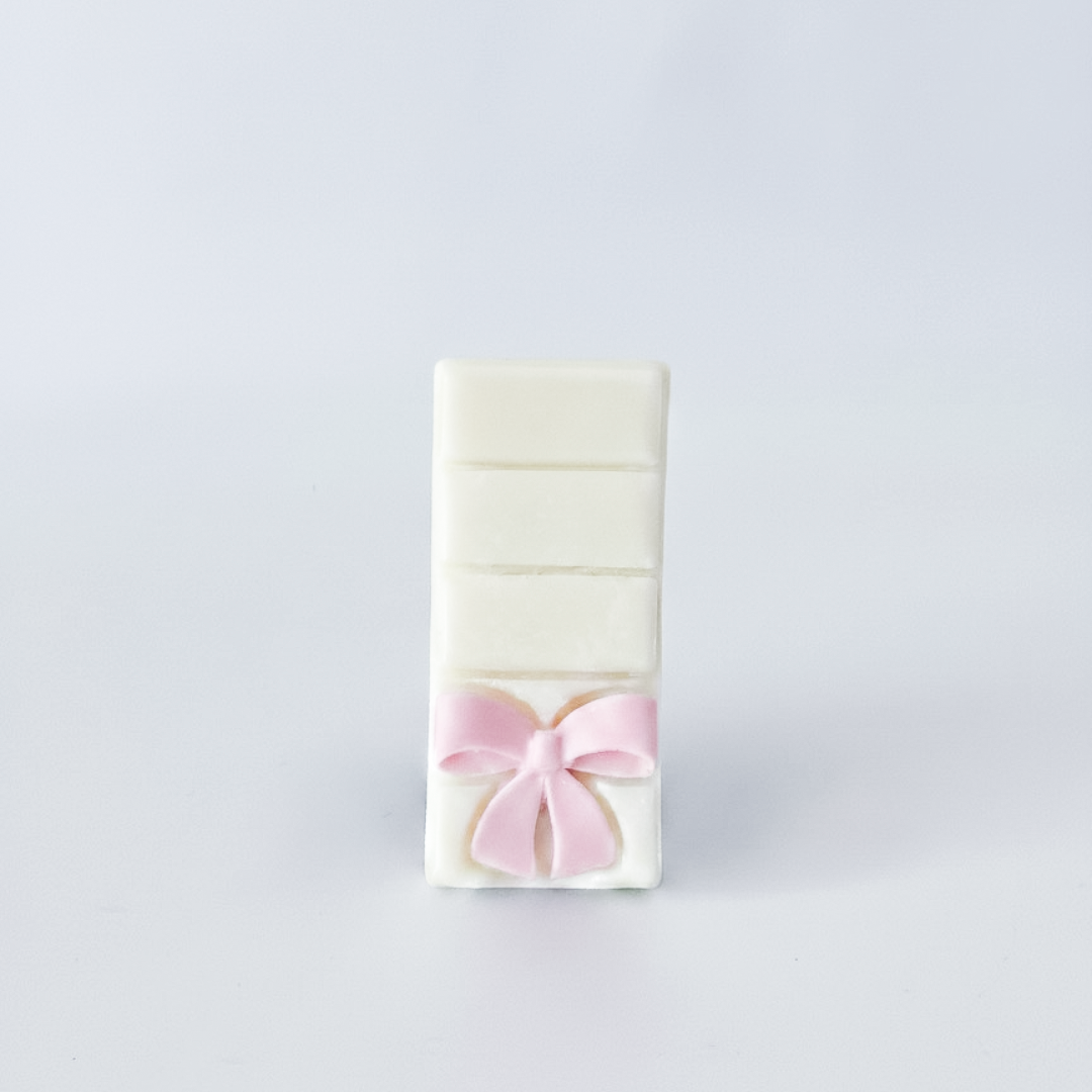 snapbar wax melt with light pink bow embedded soy wax melt Darklight Beauty