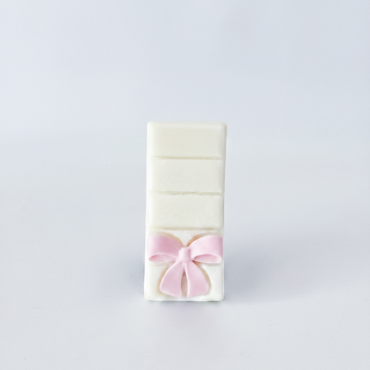 snapbar wax melt with light pink bow embedded soy wax melt Darklight Beauty