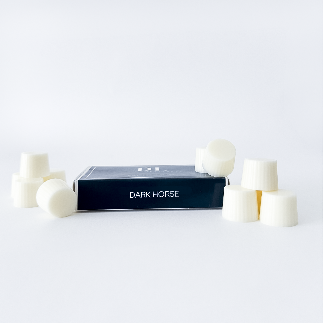 Dark Horse product packaging with white cylindrical items on a light gray background