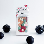 Pack of DL Christmas Limited Edition Scoopie Wax Melts with decorative packaging on a white background.