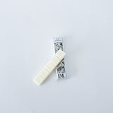 a rectangular box wax melt with 'DL' branding against a light gray background