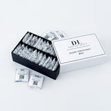 Scent discovery box with samples and branded packaging on a white background