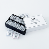 Scent discovery box with samples and branded packaging on a white background
